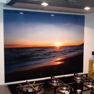 Keukenachterwand met strand en ondergaande zon